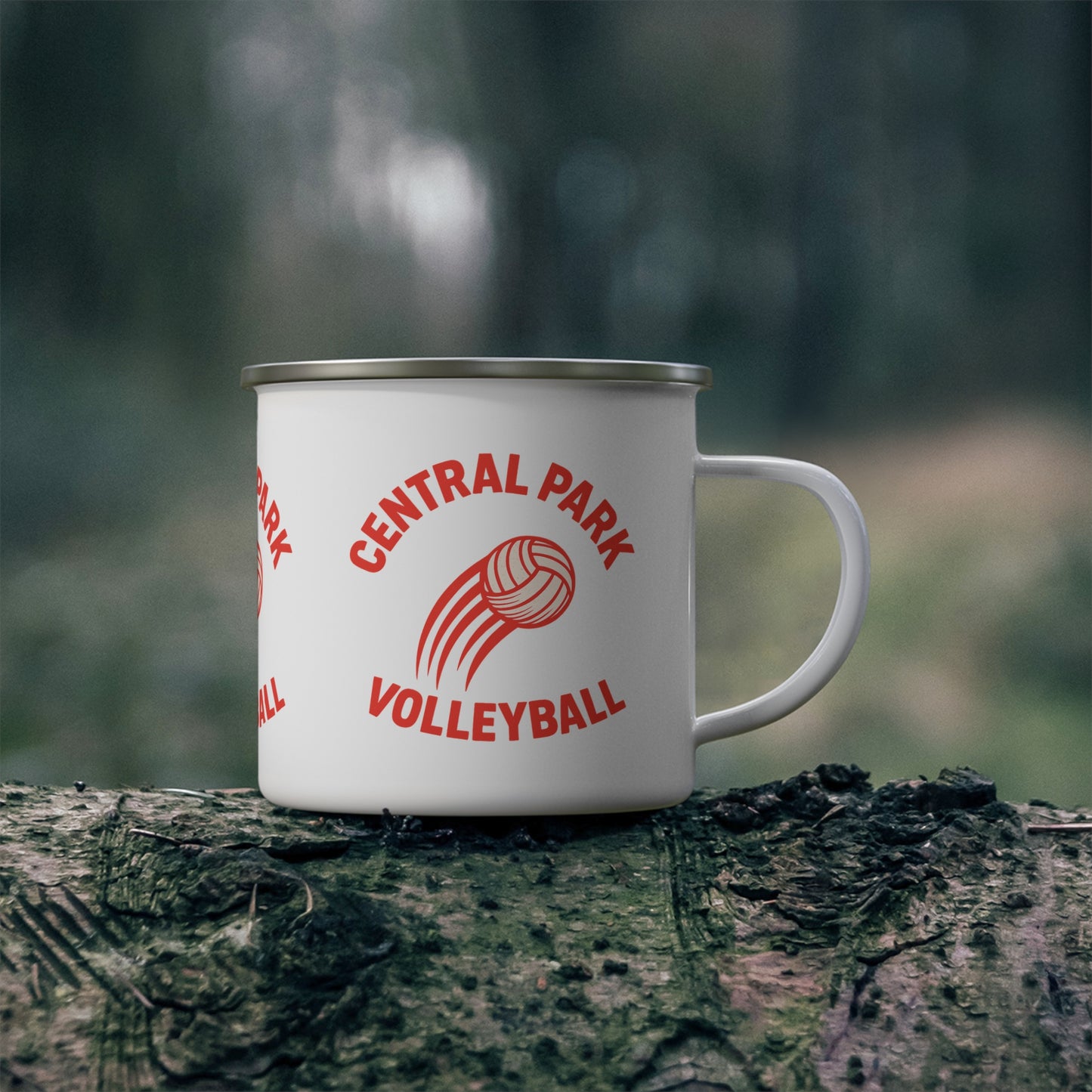 Volleyball fire enamel mug displayed with camping gear