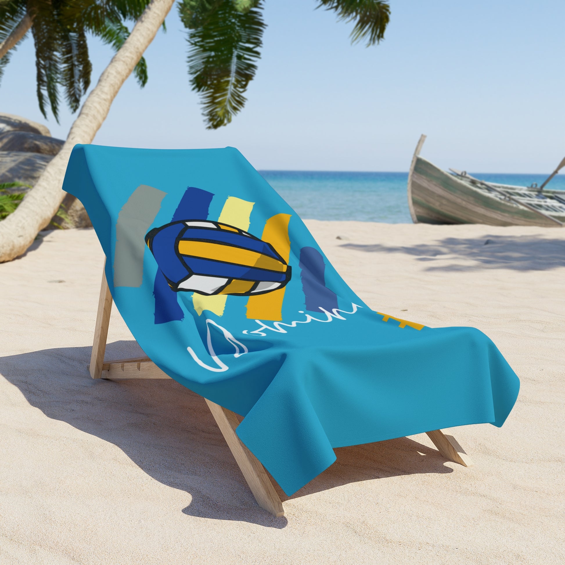 New York volleyball turquoise beach towel folded neatly beside sunglasses and flip-flops.