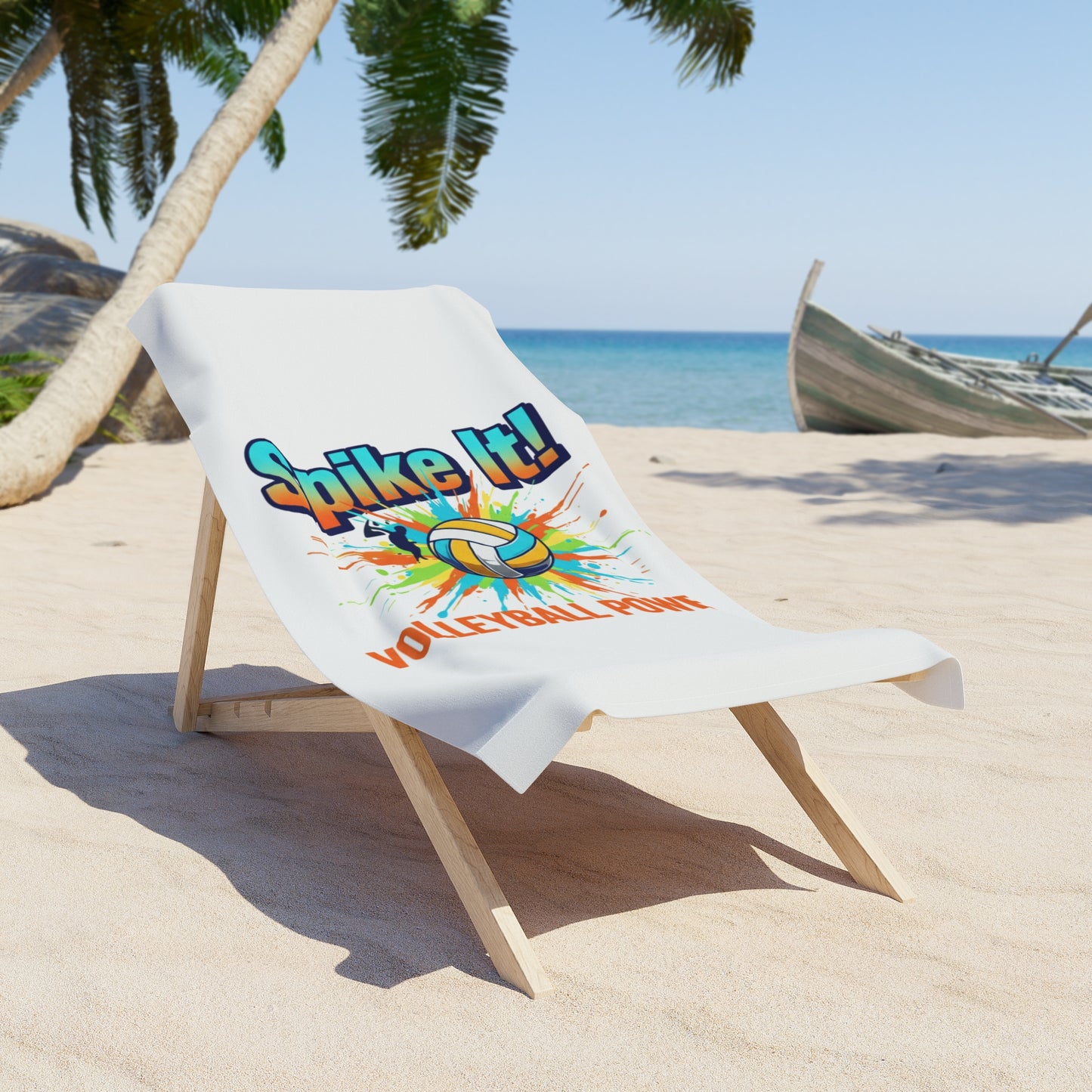 Beach volleyball towel laid out beside flip-flops and a volleyball