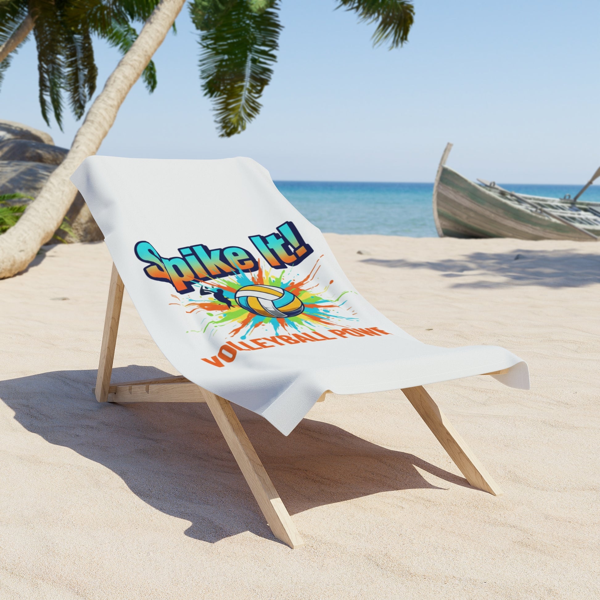Beach volleyball towel laid out beside flip-flops and a volleyball