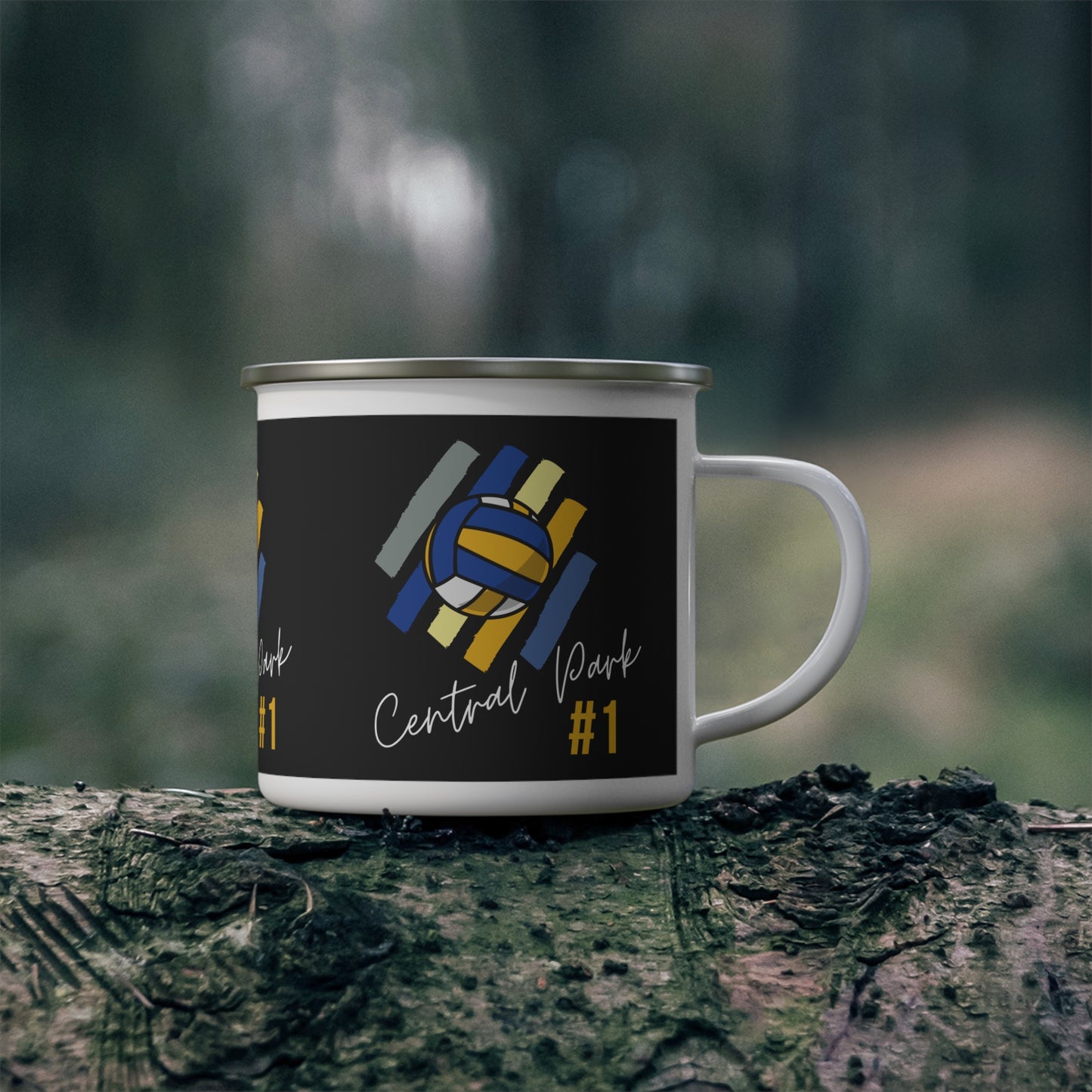 Close-up of multi-color volleyball design on enamel mug