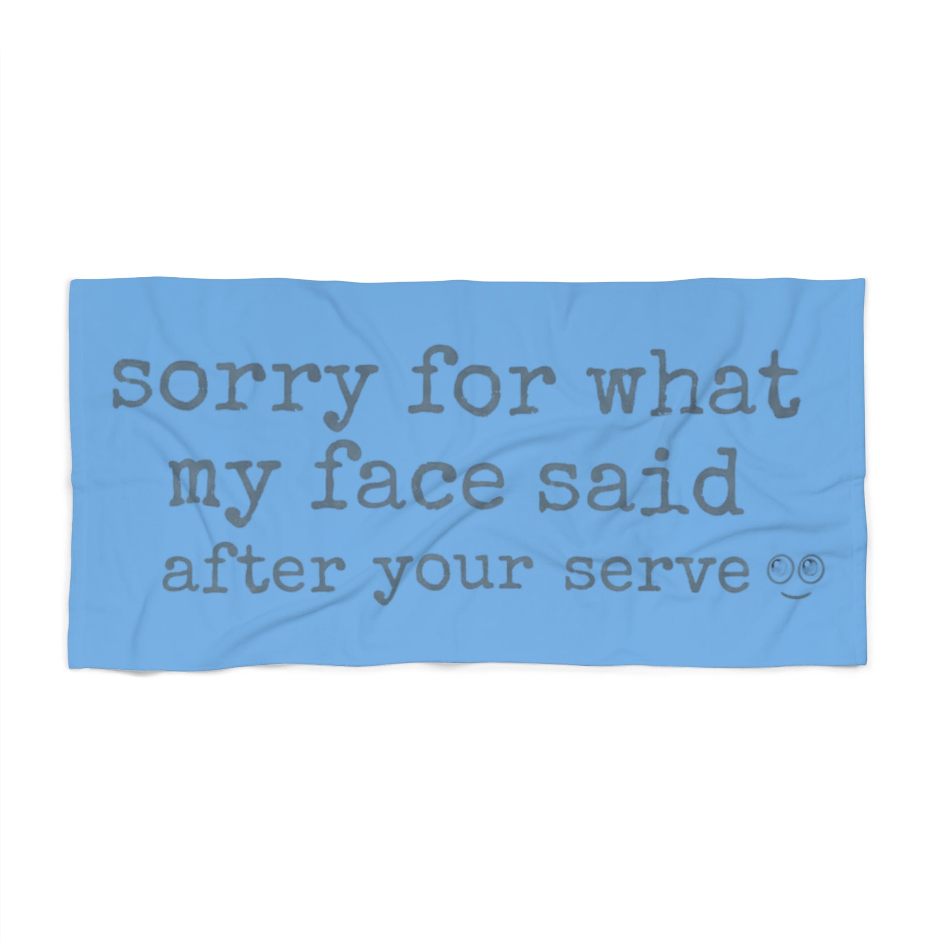 Funny volleyball beach towel with “Sorry For What My Face Said After Your Serve” text