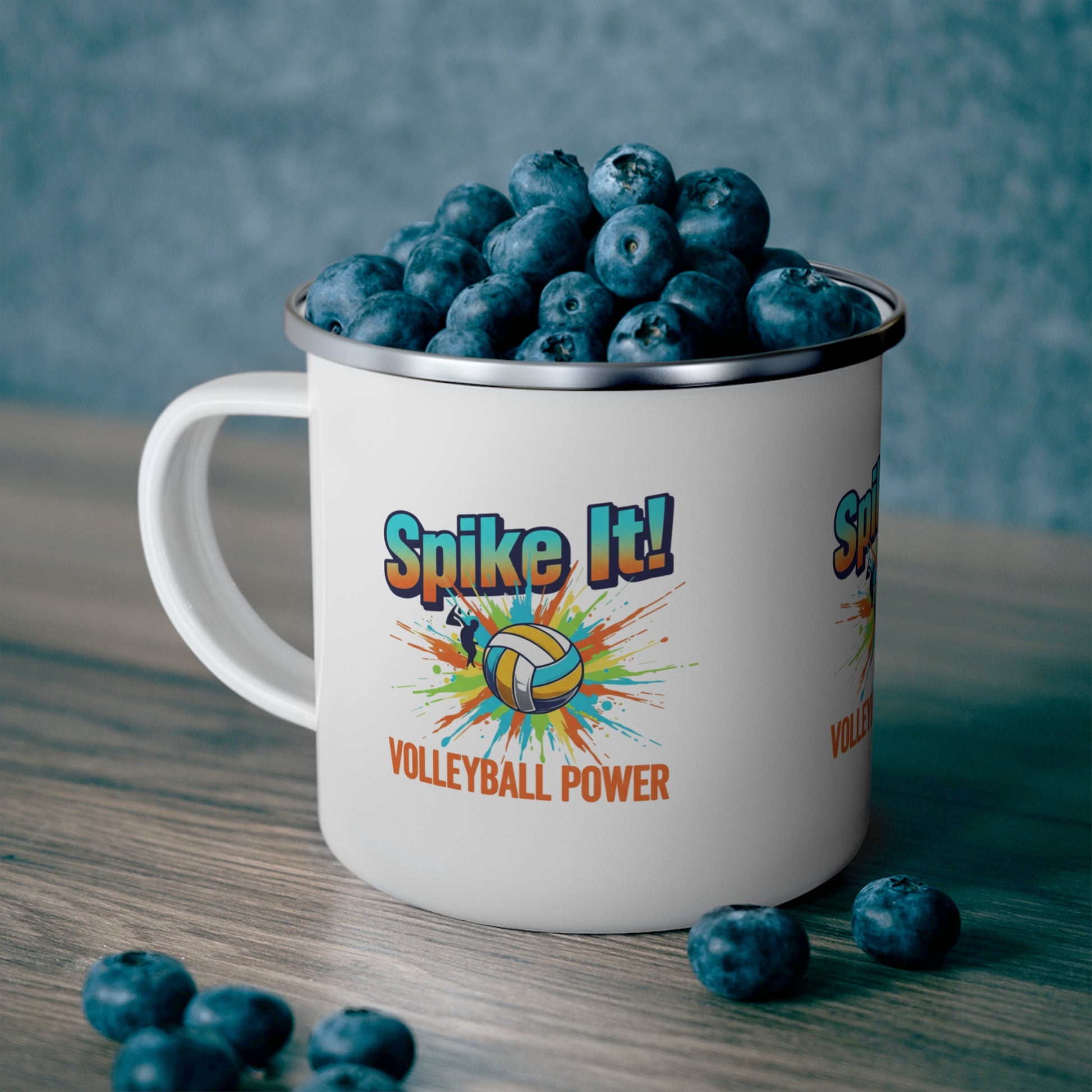 White enamel mug with vibrant volleyball splash logo