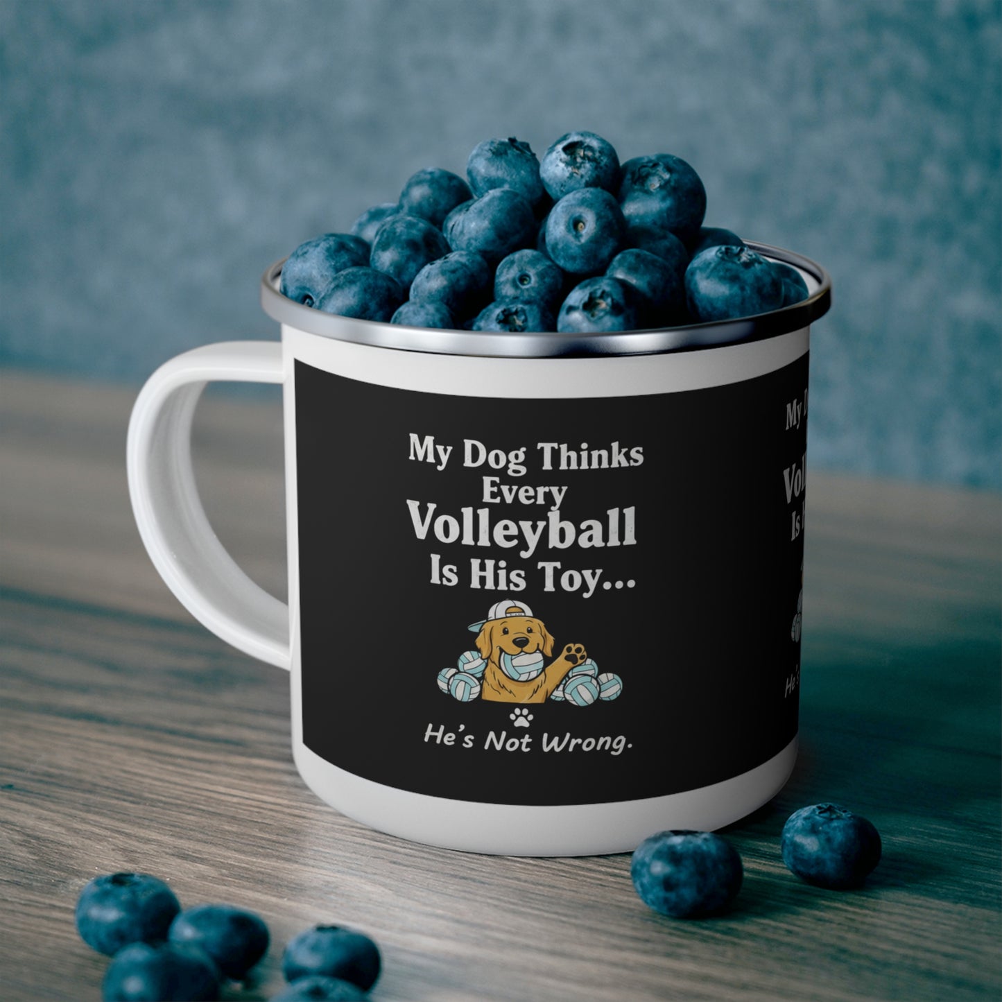 Cartoon yellow dog chewing volleyball artwork on mug.