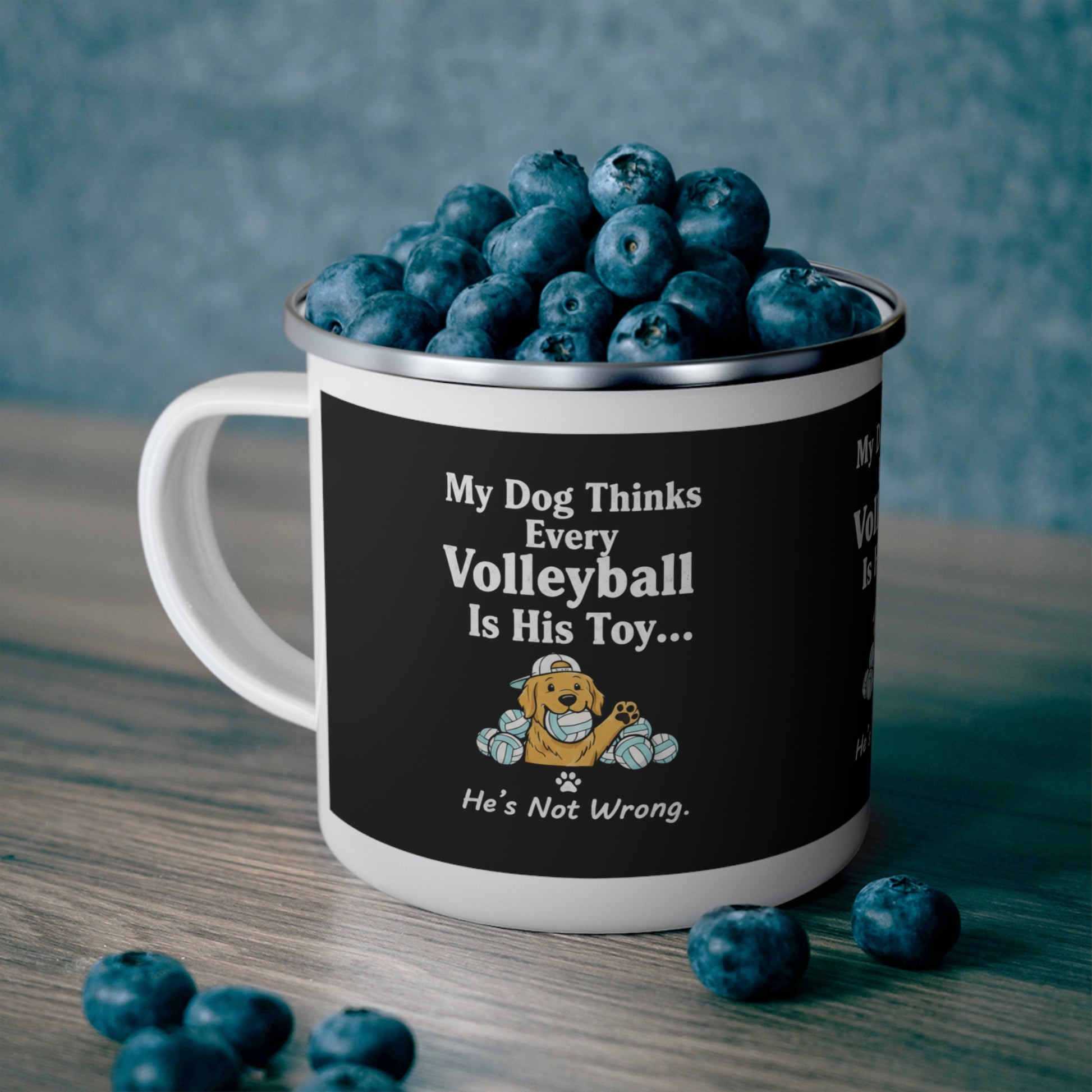 Cartoon yellow dog chewing volleyball artwork on mug.