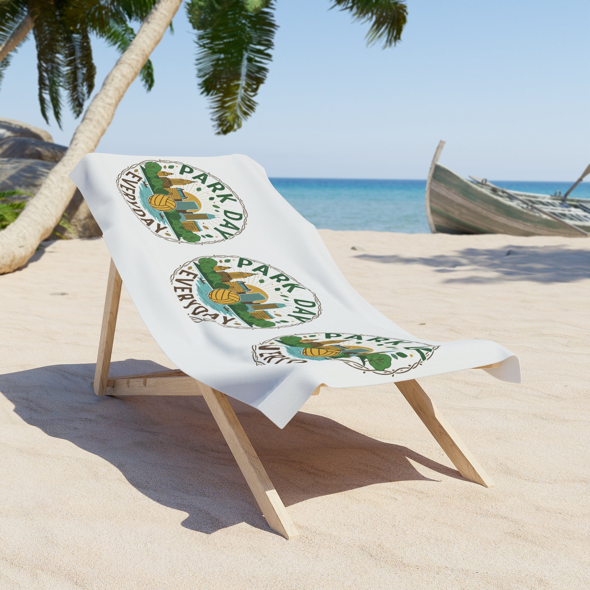 Graphic beach towel featuring Park Day Everyday text