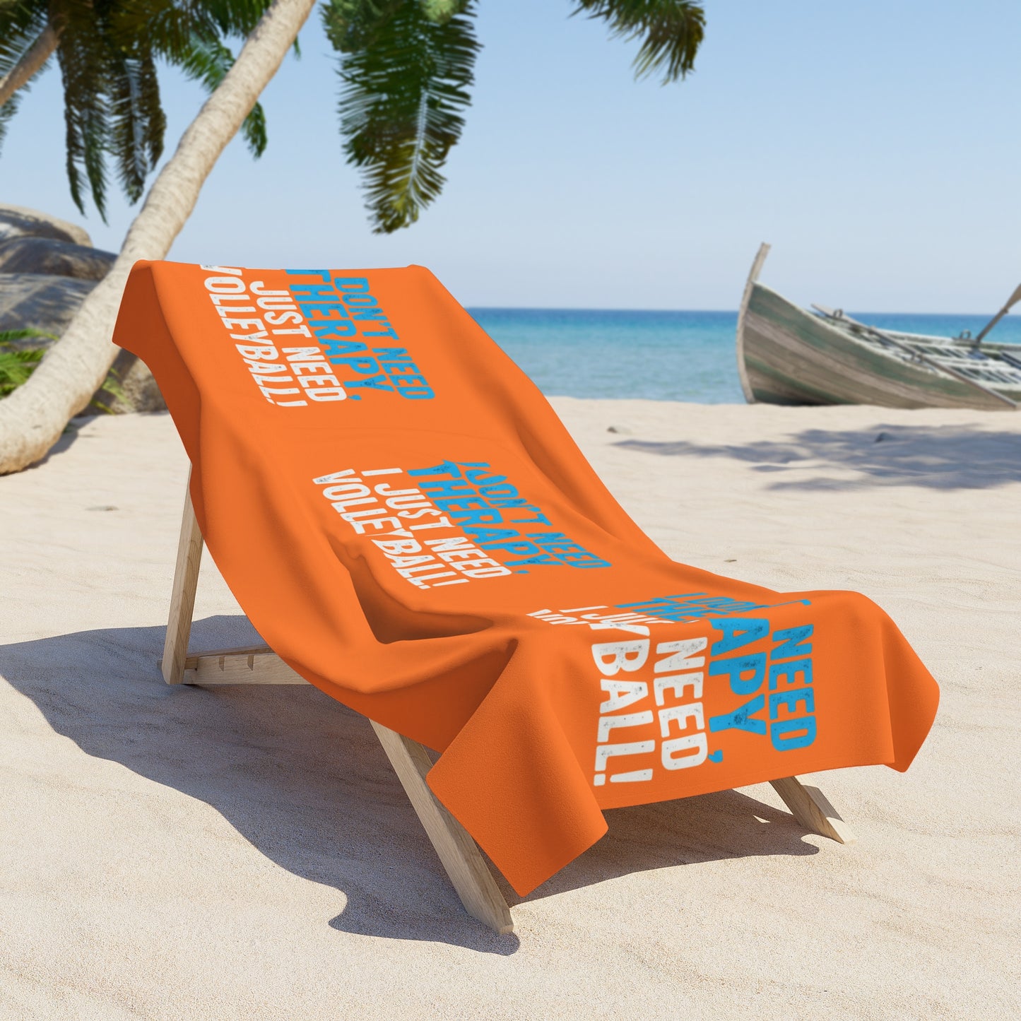 Soft cotton-backed volleyball towel laid out at the beach