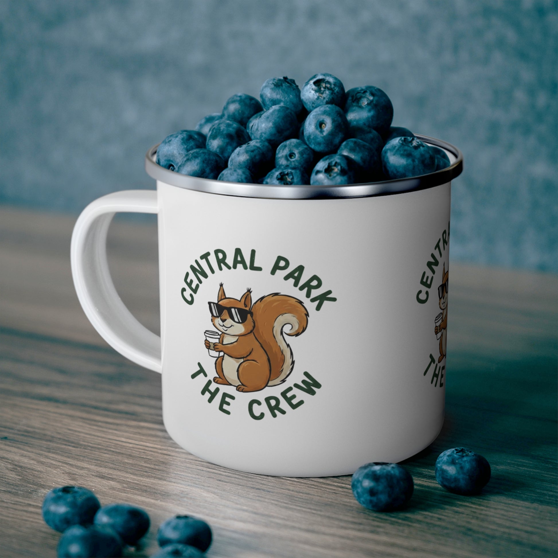 Enamel camping mug shown at an angle to display design.