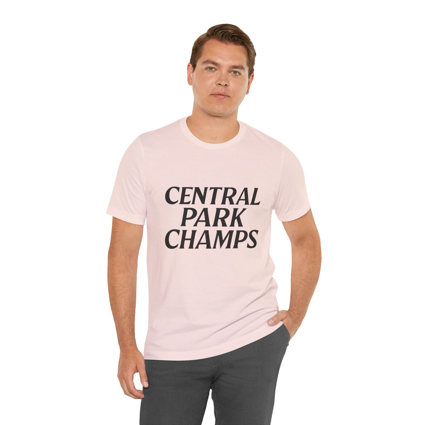 Central Park Champs tee hanging on clothing rack.