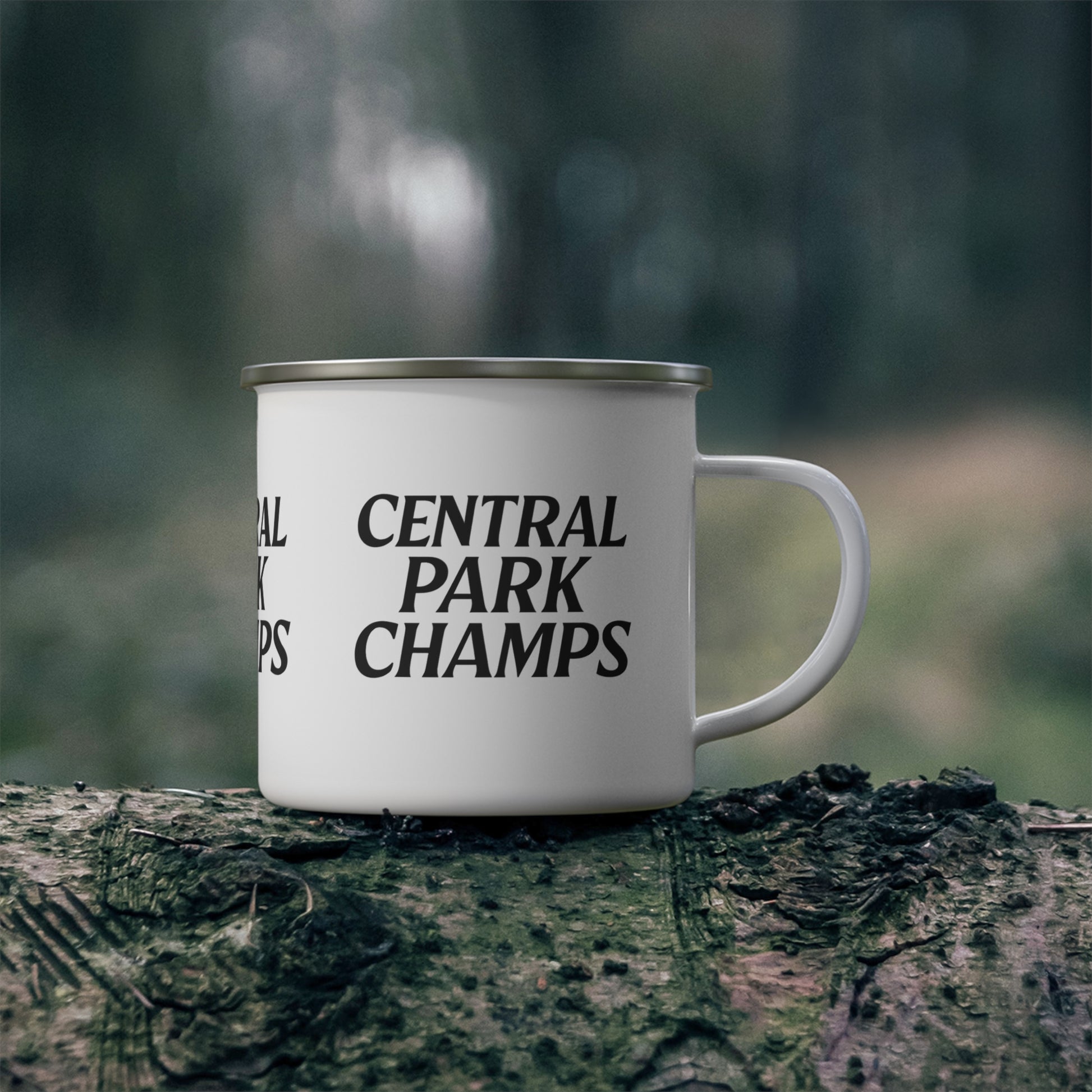 Close-up of Champs print on enamel camping mug.